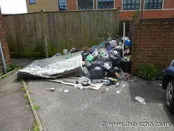 Fly-tipping outside Freemantle United Reformed Church as cars move on