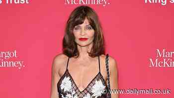 Helena Christensen, 55, wows in a sheer netted black and white dress at King's Trust Gala in New York