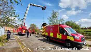 Large fire service presence by River Mersey in Warrington explained