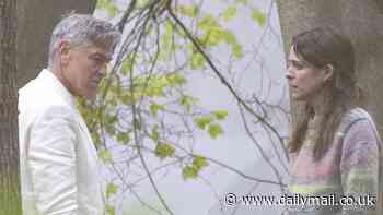 Riley Keough looks emotional as she meets a bedraggled George Clooney in eerie Hampshire woodlands while filming Jay Kelly