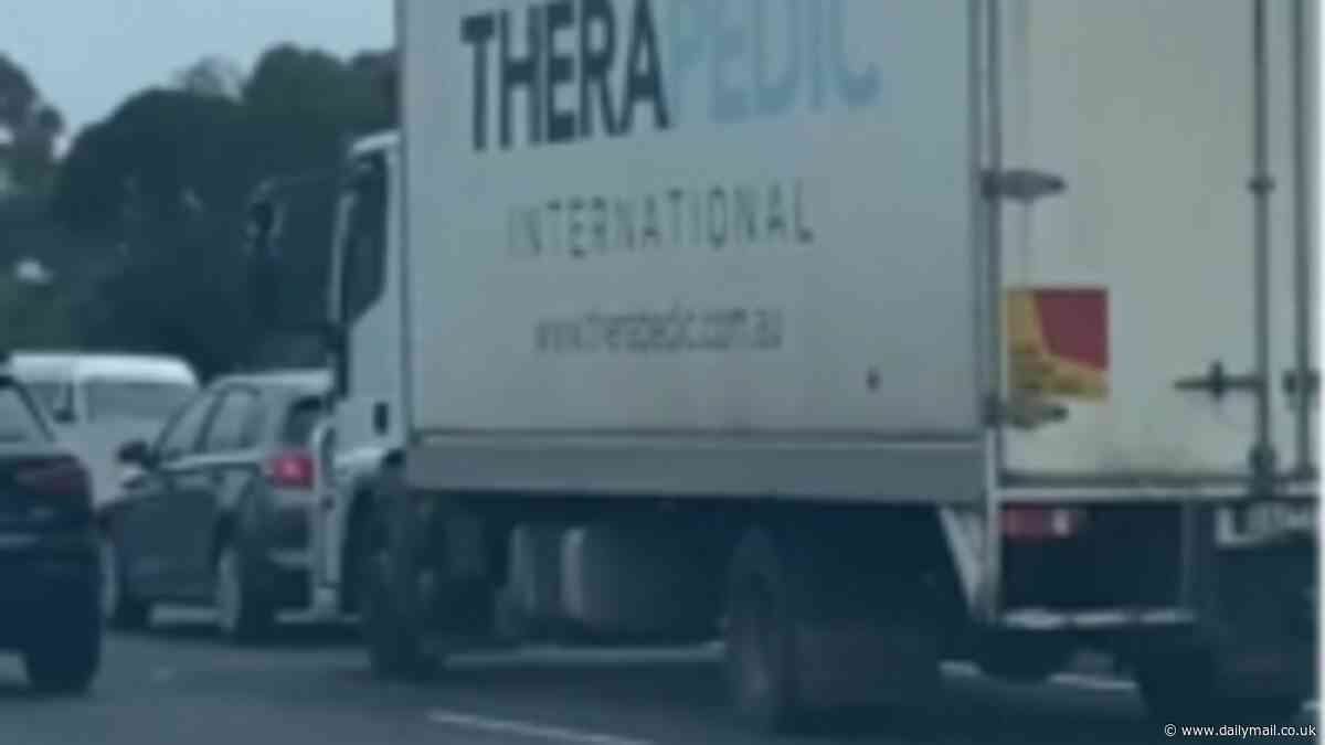 Dangerous tailgating moment caught on camera between a truck and a car on the Monash Freeway: 'Absolutely frightening'