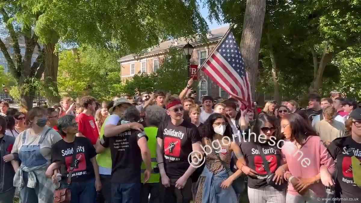 Moment patriotic Rutgers students drown out Palestine protesters with powerful rendition of Star Spangled Banner and chants of 'USA!'