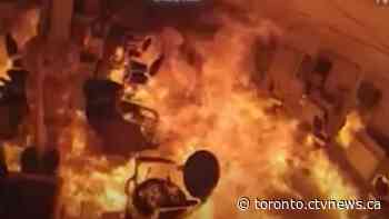 Video shows suspect setting Richmond Hill barbershop on fire