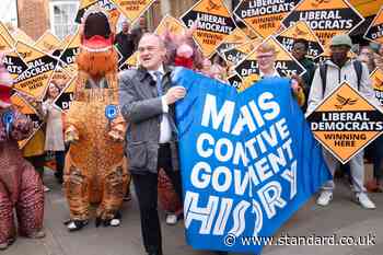 Sir Ed Davey poses with ‘Tory dinosaurs’ in latest election campaign stunt