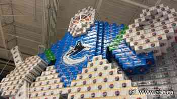 Giant Canucks display made out of Pepsi boxes draw fans into Kelowna grocery store