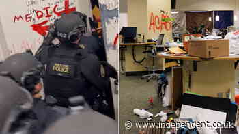 Police break through barricaded door of Portland State University library occupied by Gaza protesters