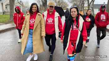WATCH | At this Red Dress Day walk, a First Nations woman explains why she's a 'helicopter' mom