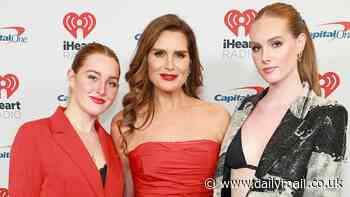 Brooke Shields reveals her adult daughters Rowan, 20, and Grier, 18, 'still sleep in the bed with me' when husband Chris Henchy is out of town