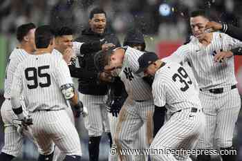 Yankees score two in the ninth to beat Tigers 2-1
