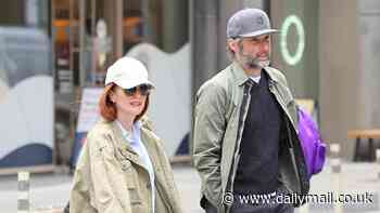 Julianne Moore rocks blue jeans and cargo jacket as she and husband Bart Freundlich take stroll in NYC