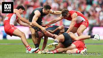 Live: Tempers flare in Sydney derby as Swans defender is concussed by high hit