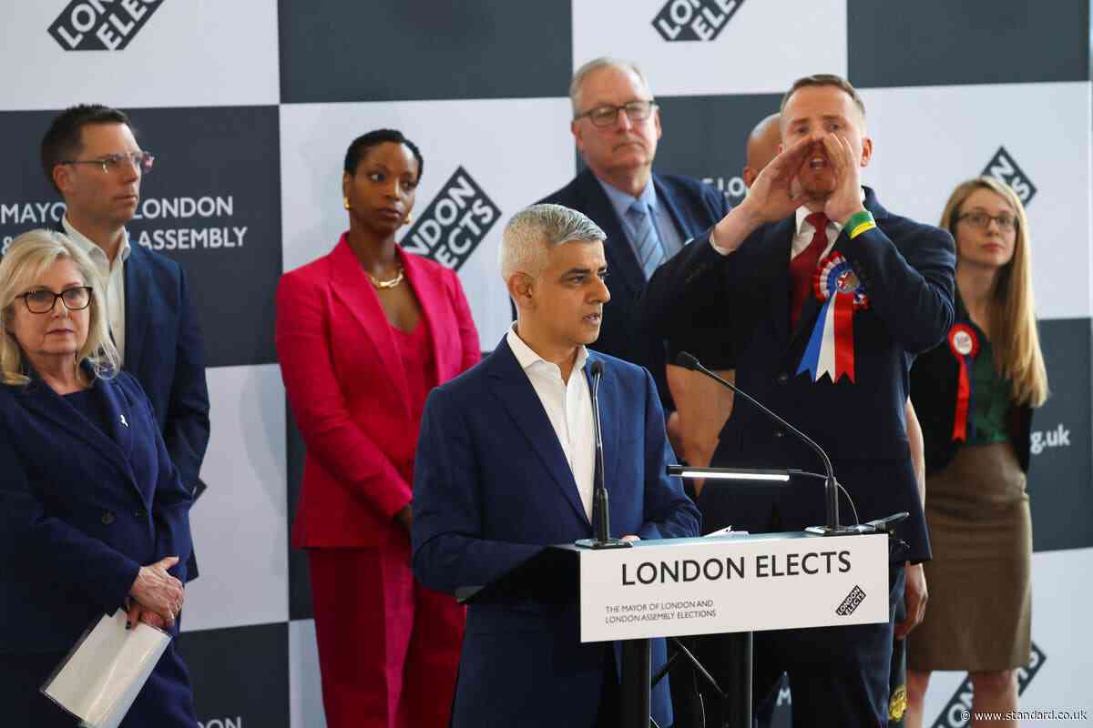 Sadiq Khan heckled by Britain First candidate just moments into victory speech