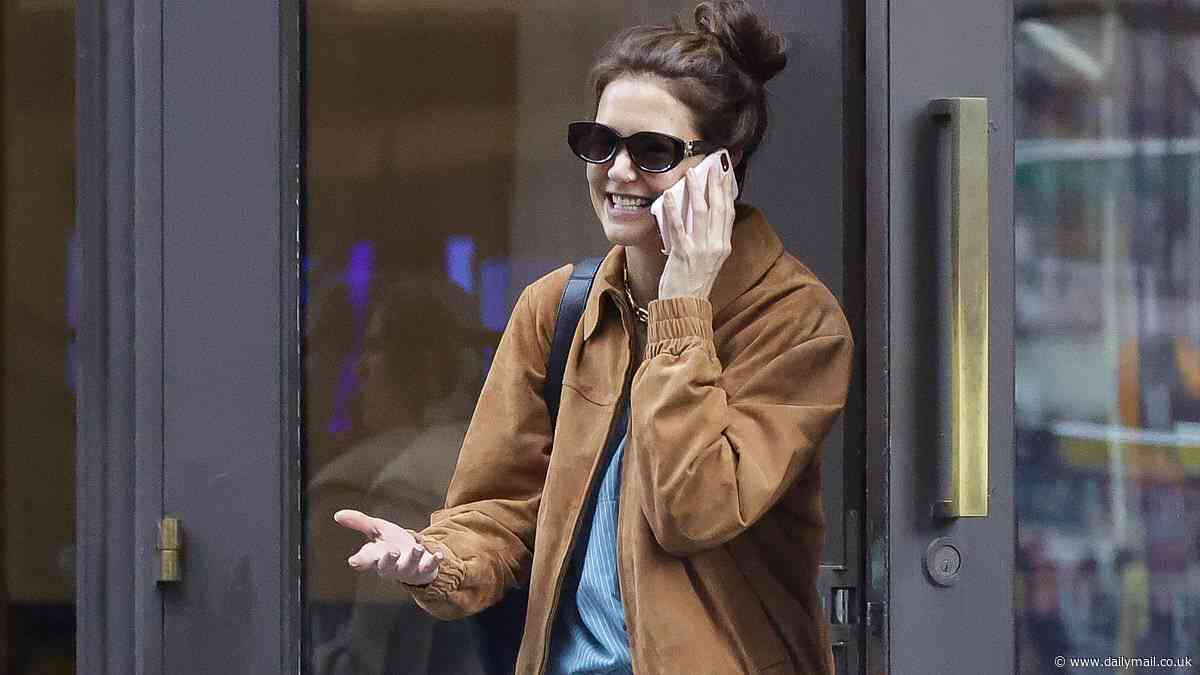 Katie Holmes looks effortlessly stylish in a suede jacket and light-wash jeans while stepping out in New York City