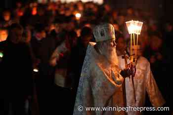 Orthodox Russians mark Easter with night-time service in Moscow cathedral