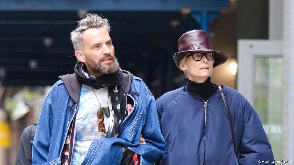 Tilda Swinton, 63, shows off her unique style in rare outing with long-term partner Sandro Kopp, 46, in New York City