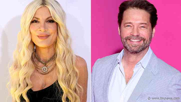 Tori Spelling says she chipped her front tooth during makeout session with Jason Priestley in an elevator
