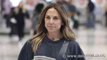Spice Girl Mel C is surrounded by eager fans as she lands at Sydney Airport amid Australian DJ tour