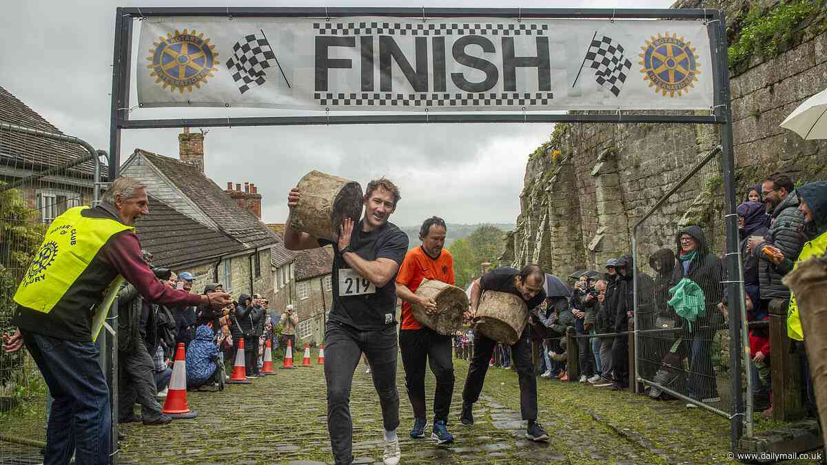 On your marks...! Dozens of competitors lug heavy blocks of cheese as they race up Hovis Hill made famous from the 1973 advert