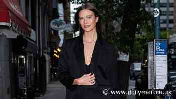 Karlie Kloss flaunts her long legs wearing a tiny LBD and $795 Louboutin pumps in NYC... ahead of the Met Gala festivities