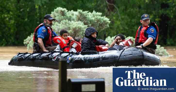 At least 400 rescued from flooding in Texas as waters continue rising