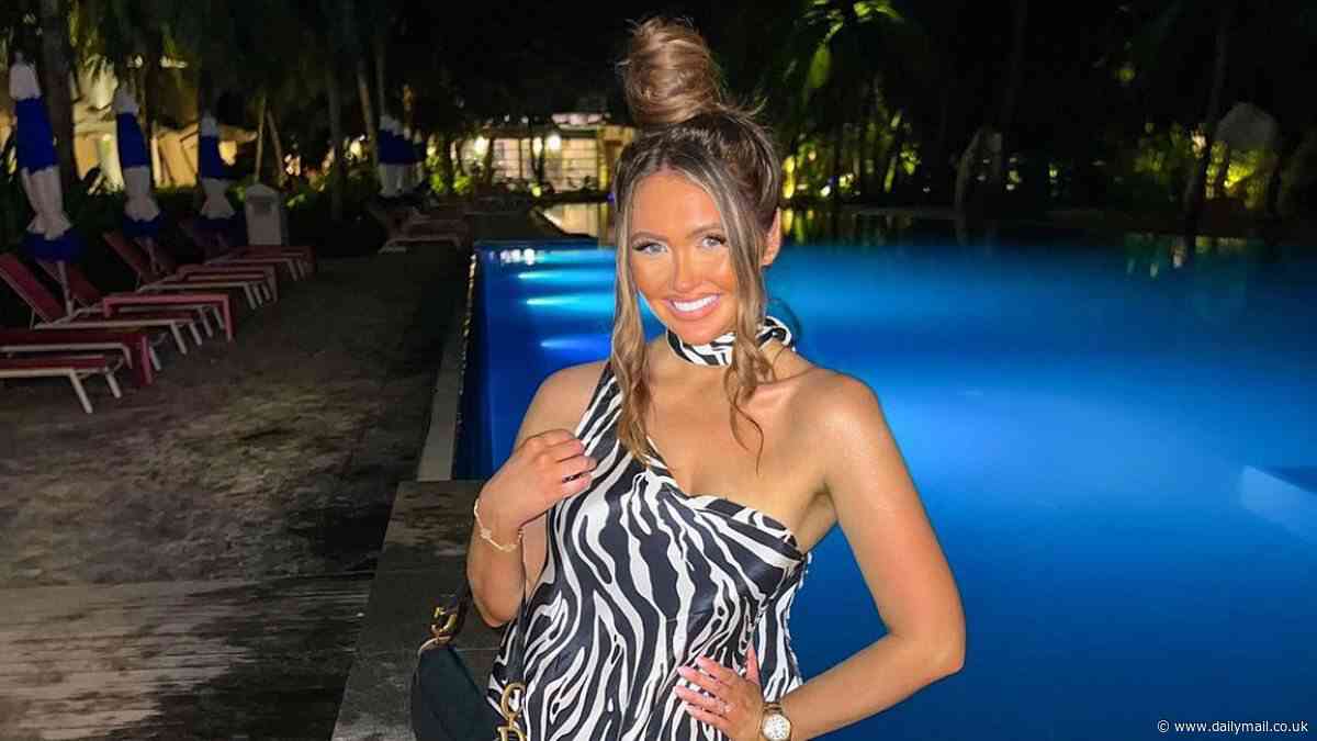 Charlotte Dawson shows off her new trim figure in thigh-split zebra print dress during family trip to the Maldives