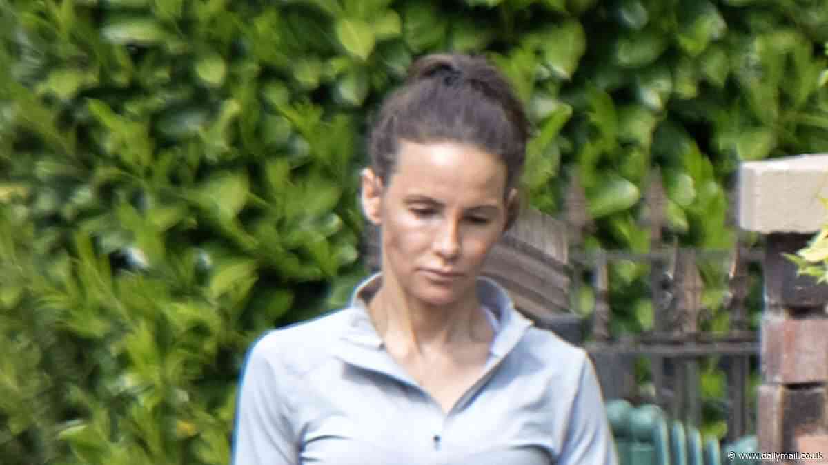 Jay Blades' wife Lisa Marie Zbozen cuts a sombre figure during a dog walk after announcing shock split from The Repair Shop star following 18-months of marriage