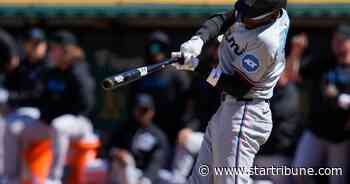 Gordon homers and gets 4 hits to lead Marlins past A's 12-3