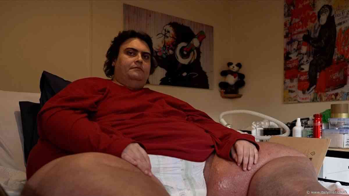 Grieving mother of Britain's heaviest man worried he will not be able to be cremated because of his 50-stone frame