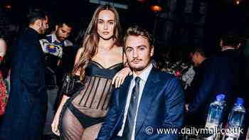 Pamela Anderson's son Brandon Thomas Lee looks handsome in blue suit and tie alongside model girlfriend Lily Easton at Monse Maison Pre-Met Celebration in NYC