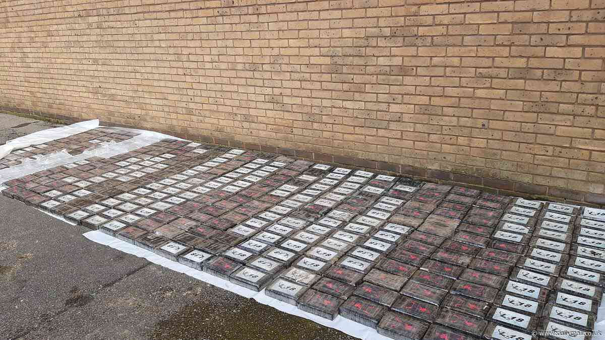 Four men are charged after half a tonne of cocaine worth £40million is found stashed in van at village pub car park