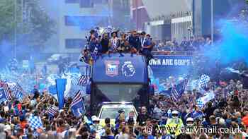 Back in the big time! Ipswich celebrate stunning Premier League promotion in style with boozy open top bus parade - as thousands flock to cheer on their heroes