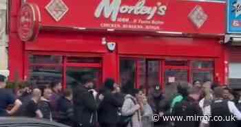 Mass brawl outside chicken shop spills into traffic forcing motorists to swerve