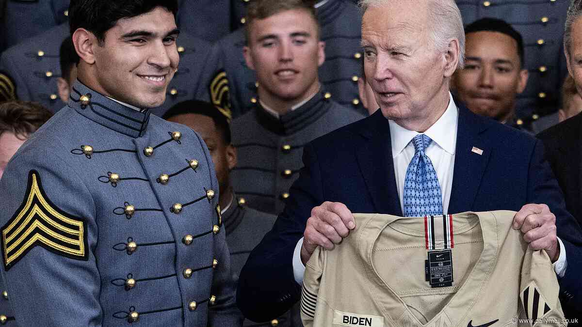 Look to your right! Biden fumbles while awarding trophy to Army football and asks 'Where are you, coach?' as team boss is standing next to him