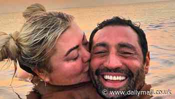 Gemma Collins looks more loved-up than ever as she plants a sweet kiss on fiancé Rami Hawash in romantic snap in the sea