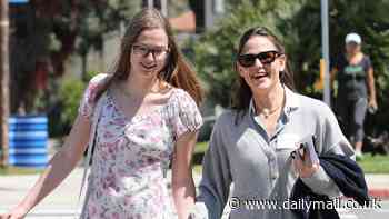 Jennifer Garner's look-alike daughter Violet, 18, towers over her mom, 52, as they sweetly hold hands in Los Angeles