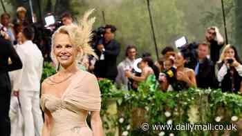 Pamela Anderson, 56, breaks her no make-up rule as she makes glamorous appearance at Met Gala 2024 in champagne gown