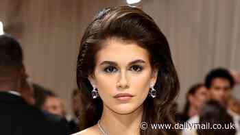 Kaia Gerber channels her mother Cindy Crawford's 90s hairstyle with voluminous waves at the 2024 Met Gala