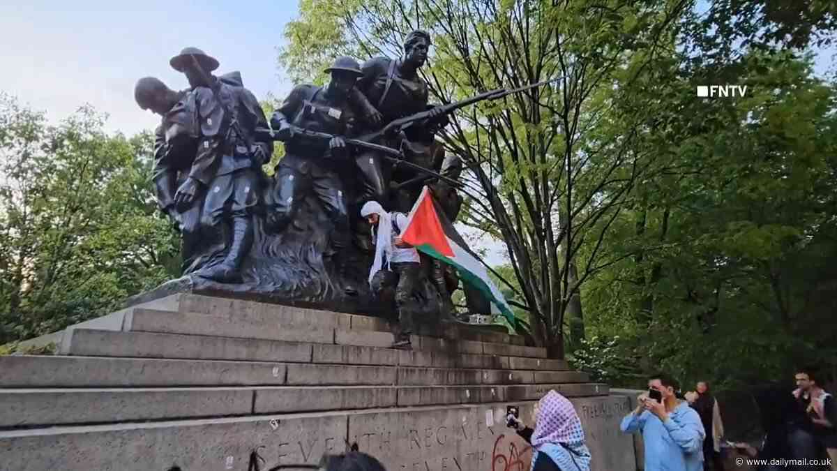 Is nothing sacred? Pro-Palestine protestors light American flag on fire outside WWI memorial as they spray paint 'Gaza' on base and shamelessly add Palestinian flag to the display