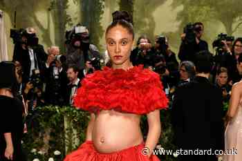 Adwoa Aboah reveals pregnancy with a baby bump-baring Met Gala dress