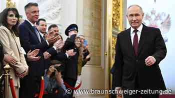 Putin liefert pompöses Spektakel – mit Überraschungsgast