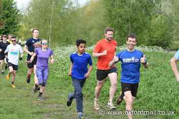 Runners at Abingdon parkrun celebrate its 13th birthday