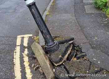 Oxford Temple Cowley damaged bollard uprooted from earth