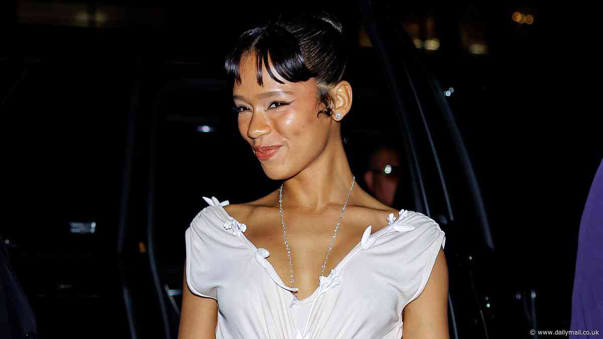 Taylor Russell exudes elegance in a white ruched dress as she arrives at a star-studded afterparty following her glamorous Met Gala debut