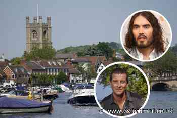 Bear Grylls helps baptise Russell Brand in Thames at Henley