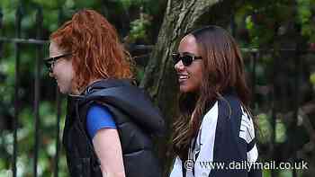 Jess Glynne and her girlfriend Alex Scott look in good spirits as they enjoy romantic stroll in Primrose Hill