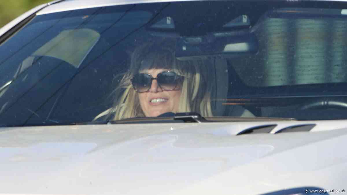 Britney Spears smiles as her felon boyfriend Paul Soliz drives her $200K Mercedes... after she worries fans with strange display at Chateau Marmont
