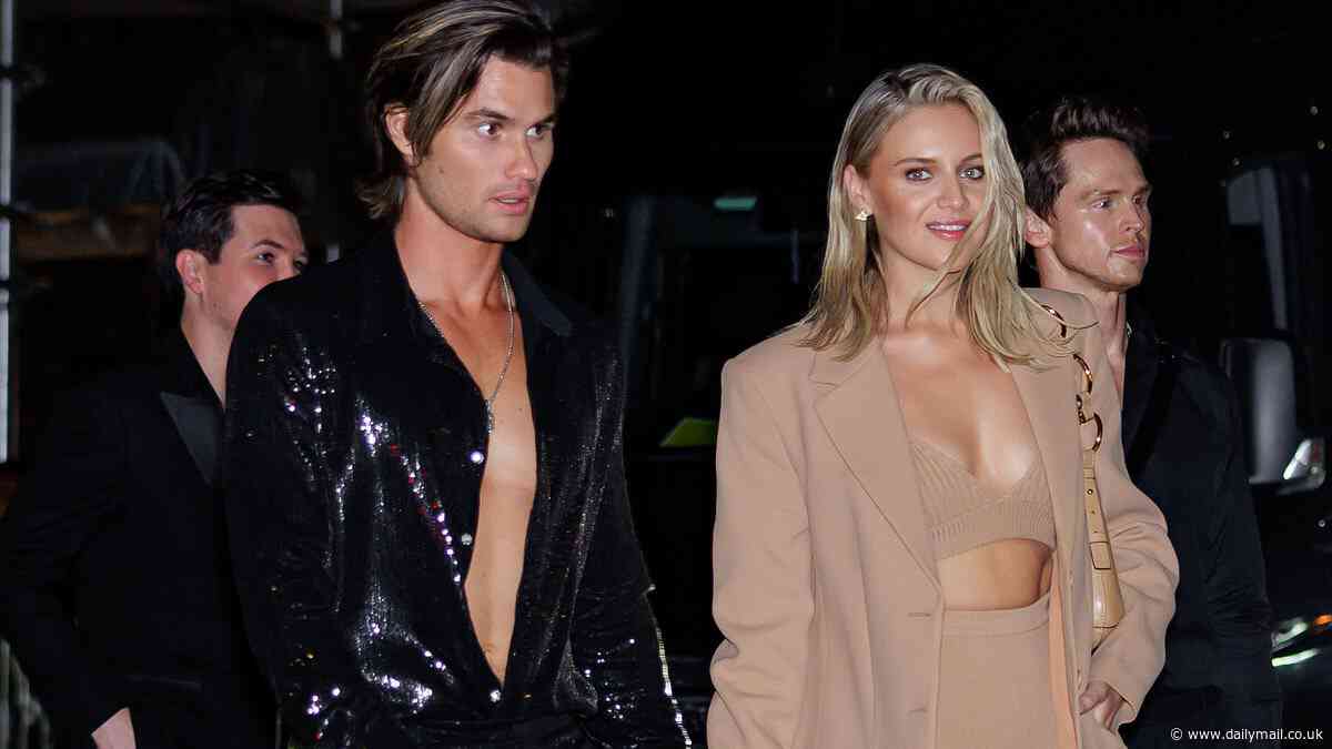 Kelsea Ballerini steps out in a nude bra and undies with only a jacket to protect her modesty as she heads to a Met Gala afterparty with Chase Stokes