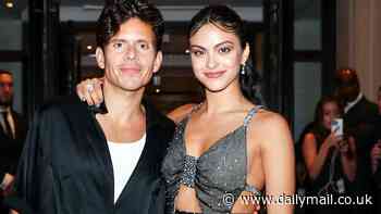 Camila Mendes poses with her boyfriend Rudy Mancuso in NYC... before taking designer Joseph Altuzarra to the Met Gala