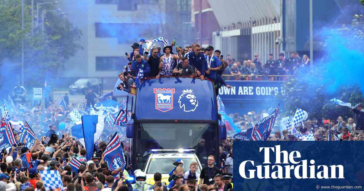 Thousands of Ipswich fans line streets to celebrate promotion parade – video