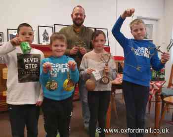 Wantage school kids make bug hotels with wildfire expert